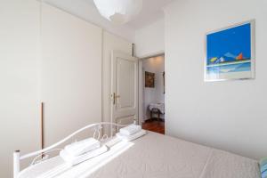 Postel nebo postele na pokoji v ubytování Apartment Alis