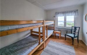 Letto o letti in una camera di 2 Bedroom Lovely Apartment In Kungshamn