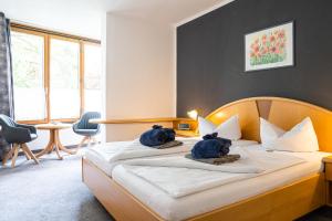 Postel nebo postele na pokoji v ubytování ThermenClubHotel "All in"