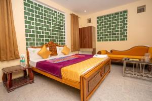Voodi või voodid majutusasutuse Hotel Misty INN toas
