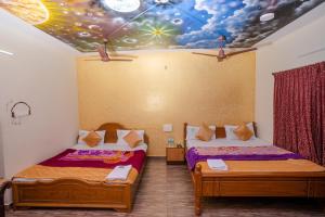 Voodi või voodid majutusasutuse Hotel Misty INN toas