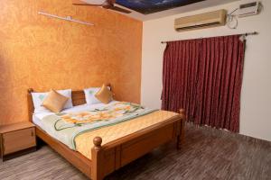 Voodi või voodid majutusasutuse Hotel Misty INN toas