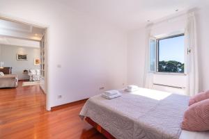 Postel nebo postele na pokoji v ubytování Apartment Alis