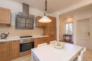 Kuchyň nebo kuchyňský kout v ubytování Apartment Alis