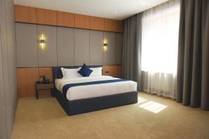 Ulaanbaatar Hotel客房内的一张或多张床位