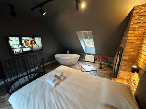 Posteľ alebo postele v izbe v ubytovaní Old Town Luxury Apartments Zgorzelec