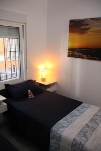 Katil atau katil-katil dalam bilik di Casa Elena Playa