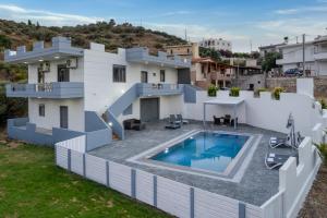 a view of a house with a swimming pool at Villa Gaia with Private Swimming Pool in Heraklion +30 photos