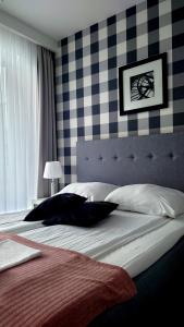 Posteľ alebo postele v izbe v ubytovaní Willa Długa No. 4 Bed & Breakfast
