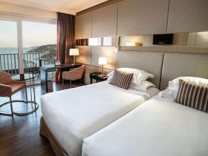 Posteľ alebo postele v izbe v ubytovaní Mercure Monte Igueldo