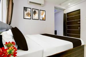 Postel nebo postele na pokoji v ubytování Super Hotel O Chhatrapati Nagar
