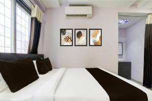 Postel nebo postele na pokoji v ubytování Super Hotel O Chhatrapati Nagar