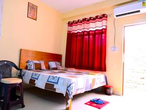 Postel nebo postele na pokoji v ubytování Jankivihar Homestay at Prahladghat within 1km from Shri Ram Mandir