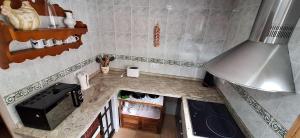 Kuchyň nebo kuchyňský kout v ubytování Apartamentos Casa May 2 - Centro Benidorm- Solo Mayores de 30 años y familias + 22 fotografií