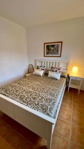 A bed or beds in a room at Daro 3D 46