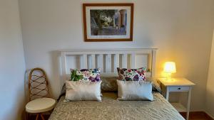 A bed or beds in a room at Daro 3D 46