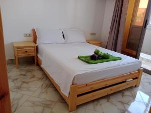 Postel nebo postele na pokoji v ubytování Ocean waves guest house