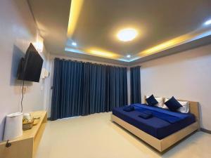 TV a/nebo společenská místnost v ubytování IBC Home ที่พักฮาลาล นครศรีธรรมราช