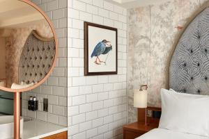 Cama ou camas em um quarto em NYX Hotel Dublin Christchurch