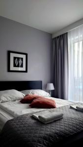 Posteľ alebo postele v izbe v ubytovaní Willa Długa No. 4 Bed & Breakfast