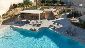 Photo de la galerie de l'établissement Villaggio Mare Suites, à Kalamaki