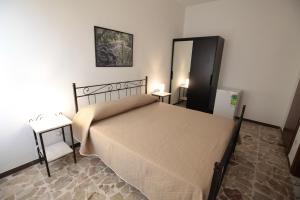 Voodi või voodid majutusasutuse B&B Tarì toas