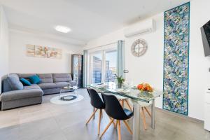 Khu vực ghế ngồi tại Apartmani Hiza i Vila