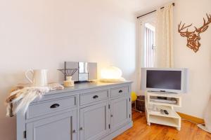 TV a/nebo společenská místnost v ubytování Apartamento con Impresionantes vistas