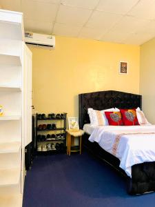 Ένα ή περισσότερα κρεβάτια σε δωμάτιο στο Super private Apartment