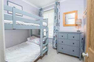 Giường trong phòng chung tại Longmoor