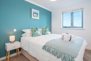 Ένα ή περισσότερα κρεβάτια σε δωμάτιο στο Shearwater