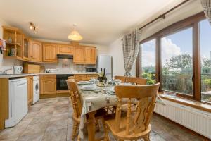 Η κουζίνα ή μικρή κουζίνα στο Gamekeepers Cottage