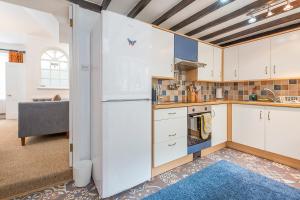 Køkken eller tekøkken på Amroth Cottage