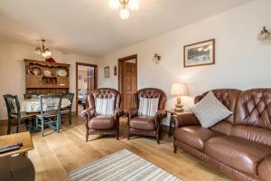 Posezení v ubytování Shepherds Cottage