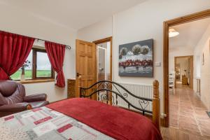 Ένα ή περισσότερα κρεβάτια σε δωμάτιο στο Drovers Cottage +29 φωτογραφίες