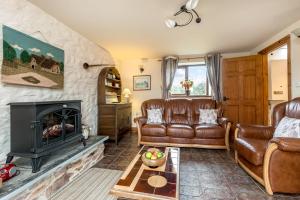 Khu vực ghế ngồi tại Coachmans Cottage