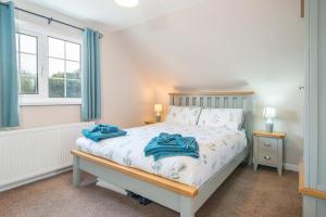 Giường trong phòng chung tại Hiraeth