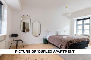 Un pat sau paturi într-o cameră la Central City Apartment on Best Location by Round Tower