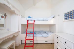 Postel nebo postele na pokoji v ubytování Delfryn