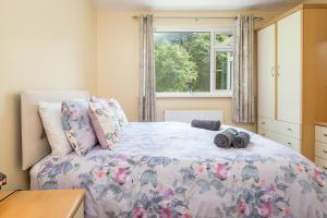 Giường trong phòng chung tại 1 Homecroft Bungalows