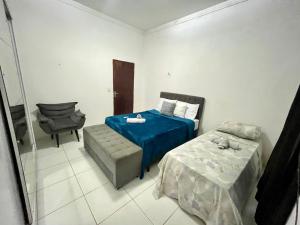 Postel nebo postele na pokoji v ubytování Casa Limar Gostoso