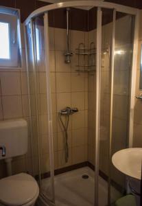 Kúpeľňa v ubytovaní Apartments Daju