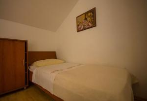 Posteľ alebo postele v izbe v ubytovaní Apartments Daju