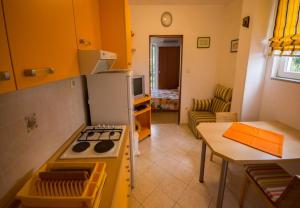 Kuchyň nebo kuchyňský kout v ubytování Apartments Daju