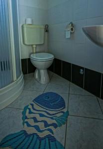 Koupelna v ubytování Apartments Daju