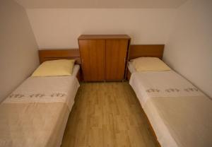 Postel nebo postele na pokoji v ubytování Apartments Daju