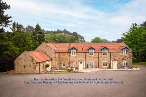 an artist impression of a house in the process of being built at Sandsend Retreats at Saltmoore in Sandsend
