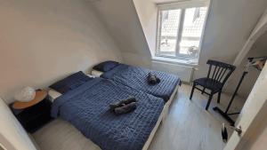 Postel nebo postele na pokoji v ubytování Villa Amsteldijck (8km from Amsterdam)