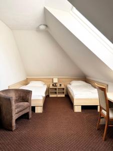 Postel nebo postele na pokoji v ubytování Motel DB2000