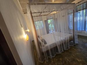 Letto o letti in una camera di Ginger Harmony Guesthouse and Cafe